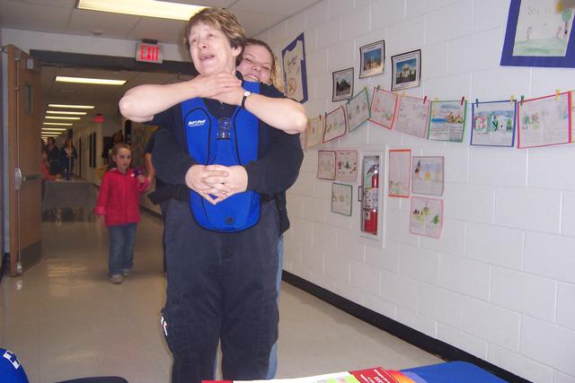 Abdominal thrusts demostrated for choking victim at health fair 1/25/10